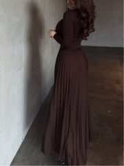 Brown long-sleeved top and pleated skirt set
